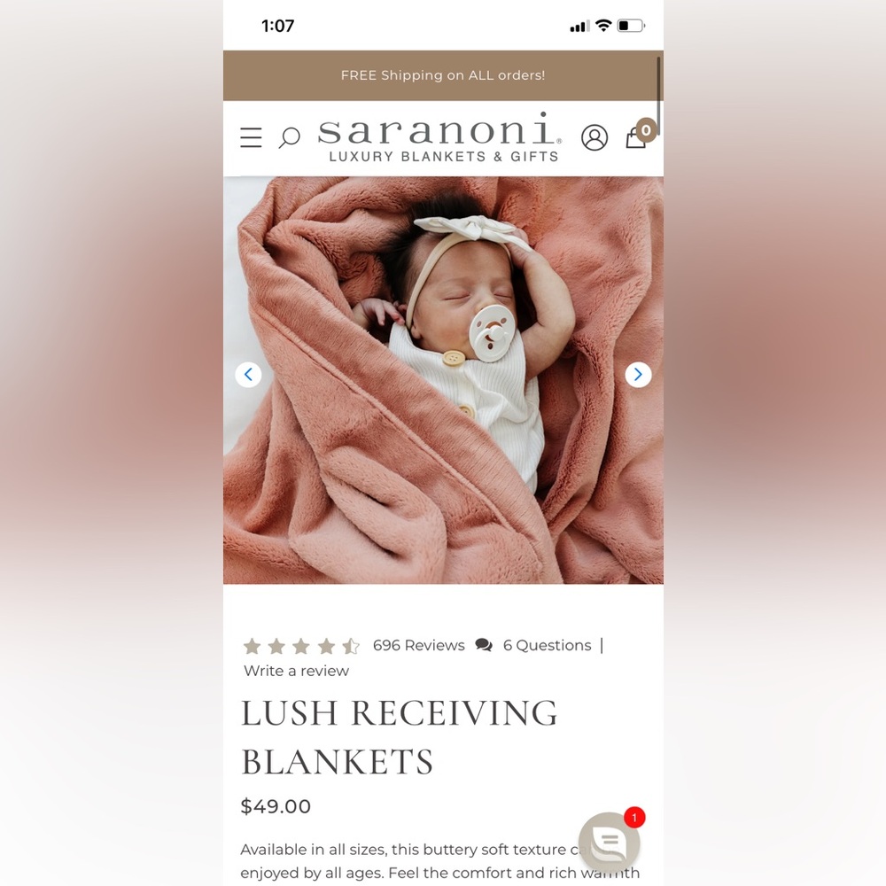 Brand new never used Saranoni rose colored blanket - receiving size